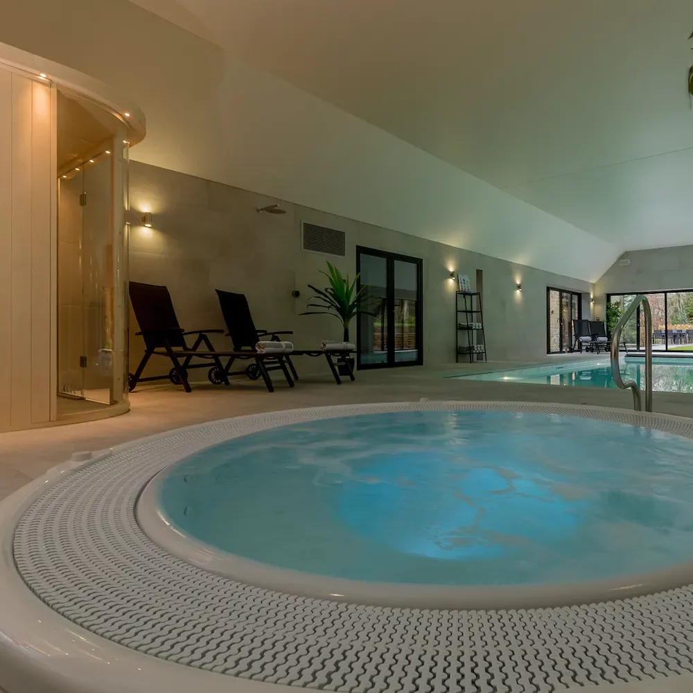 Hot tub sauna and indoor swimming pool at Kingshay Barton